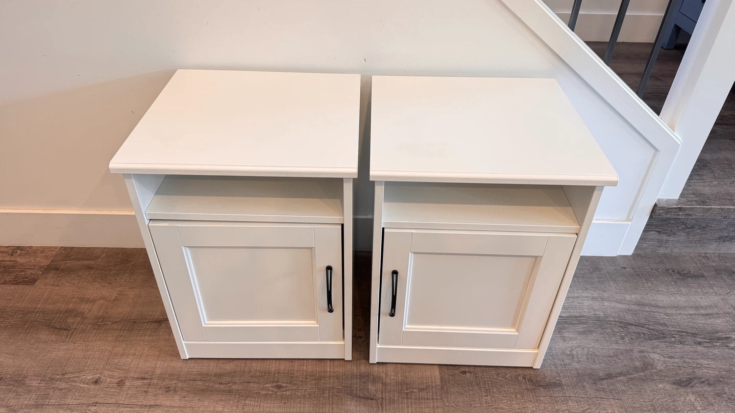 pair of IKEA nightstands in white