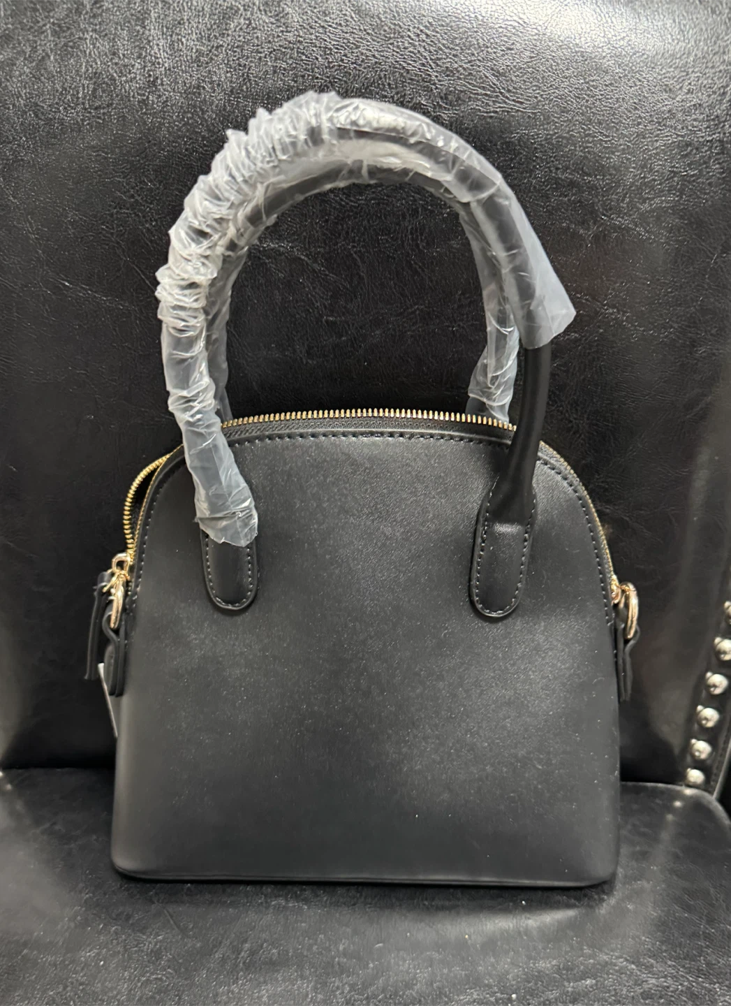 Black dome handbag with gold accents - photo 2