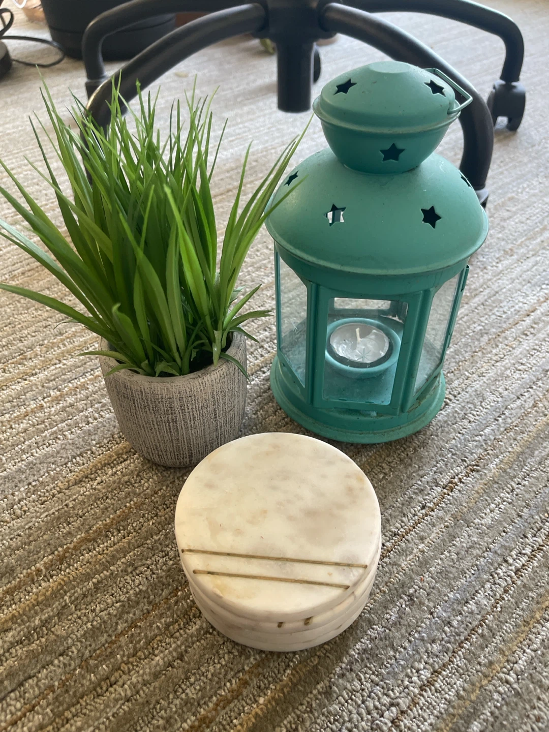 IKEA decor (lamp, faux plant, marble coasters)