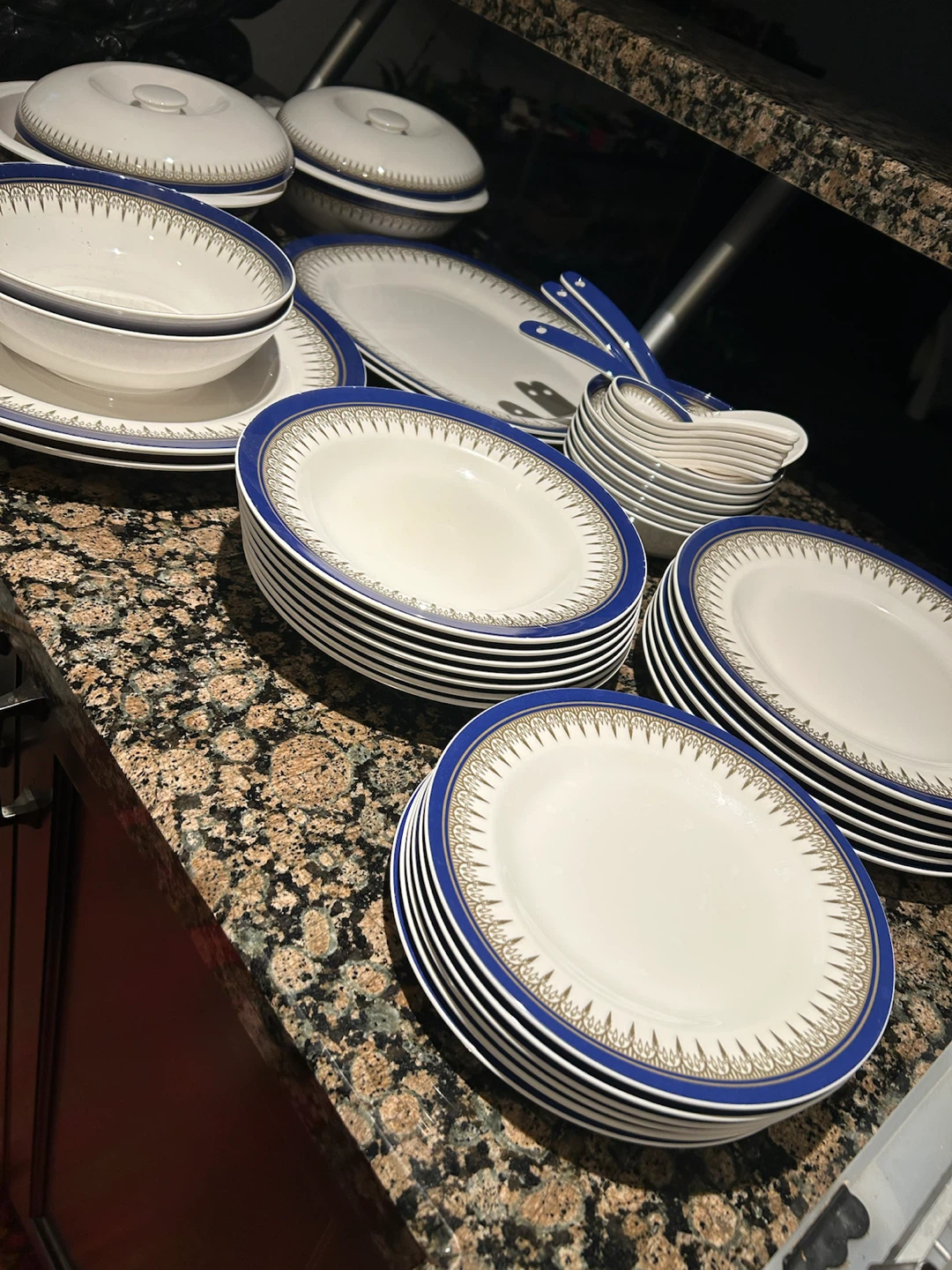 Dinnerware Set with Blue and Gold Trim