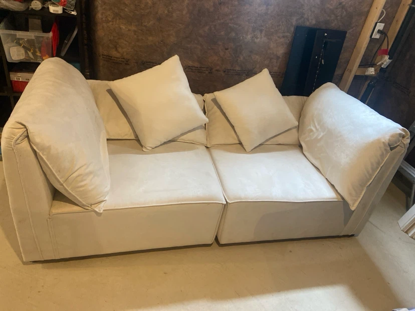 2 beige modular armchairs