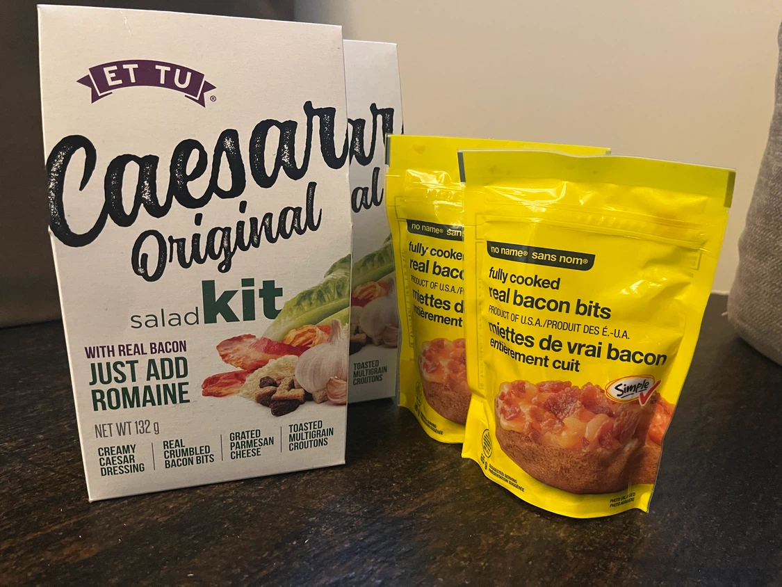 2 packs of Caesar salad kit & 2 packs of bacon bits