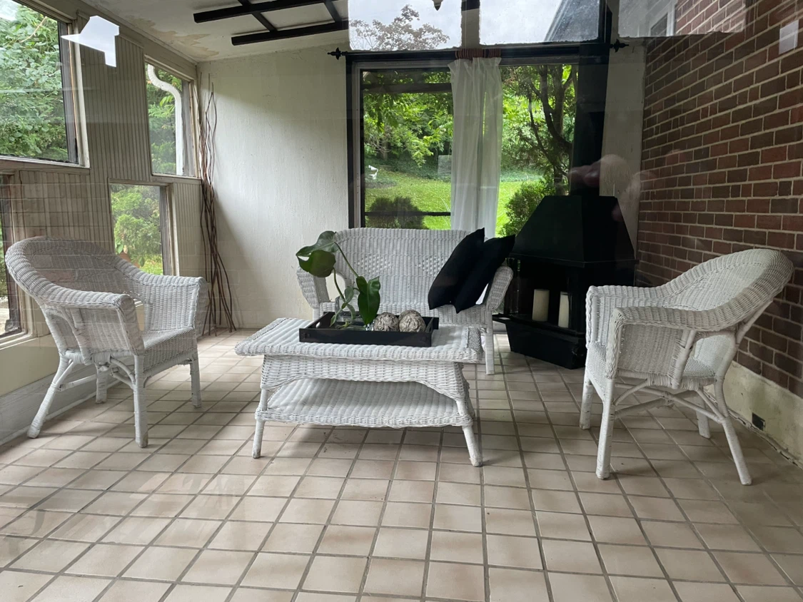 White Wicker Loveseat, Coffee Table, and Armchairs Set