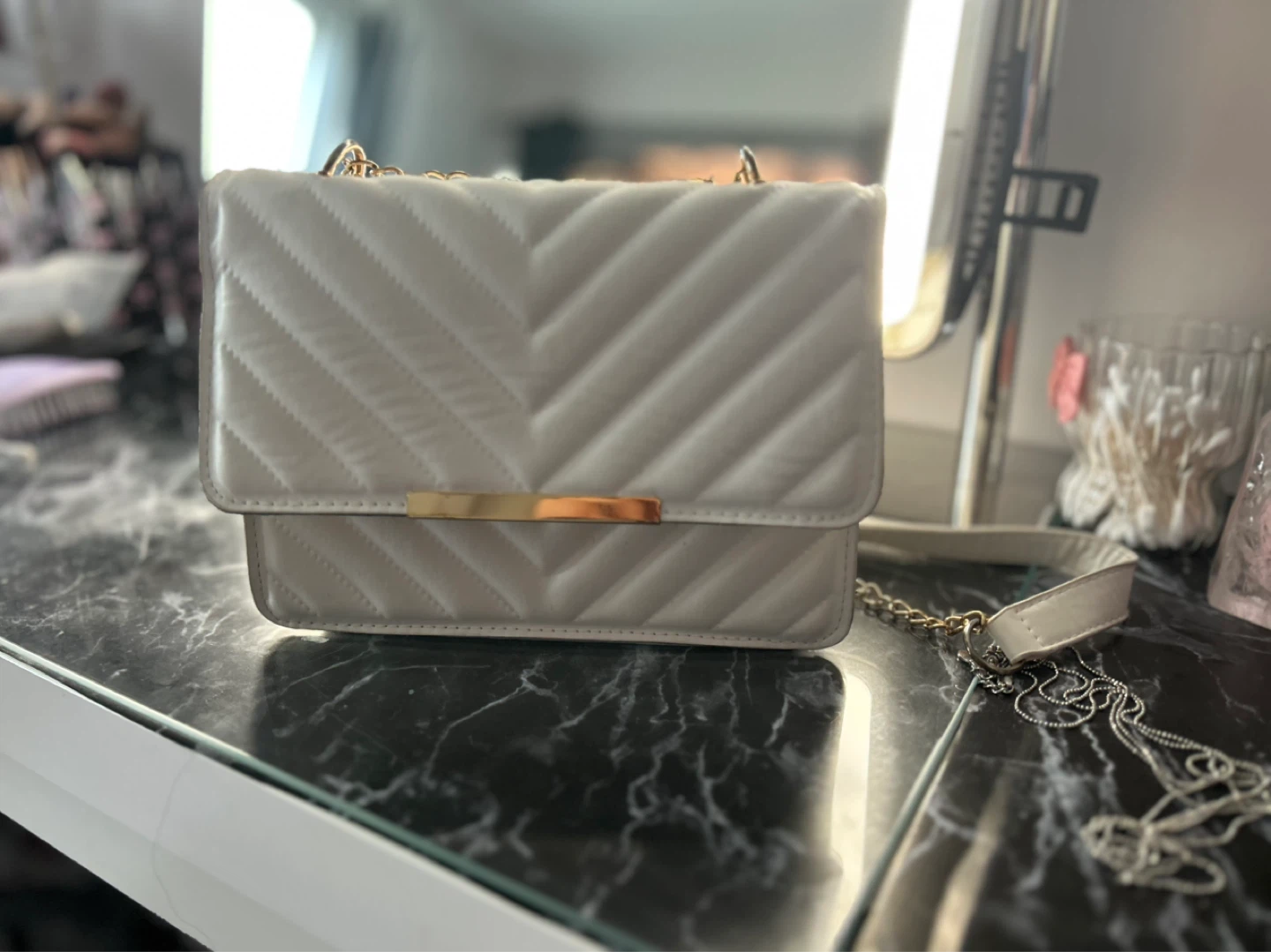 White quilted crossbody purse with gold chain