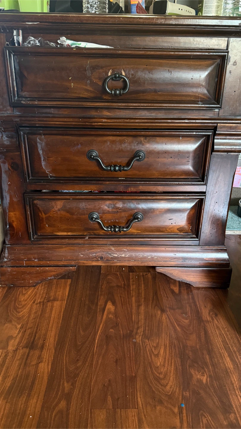 Dark Wood Nightstand with 3 Drawers from Ashley Home furniture