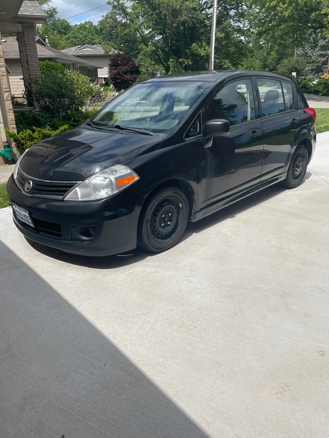 Black Nissan Versa SL Hatchback - photo 2