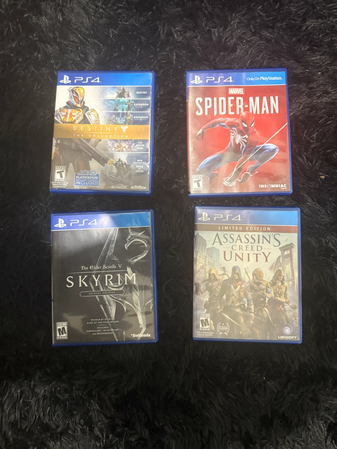 PS4 Games Bundle - Spider-Man, Skyrim, Destiny, Assassin's Creed