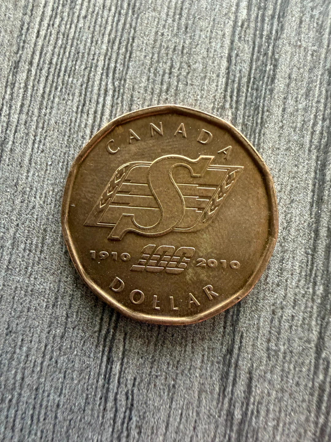 Canada 2010 Loonie - 100th Anniversary of Flight