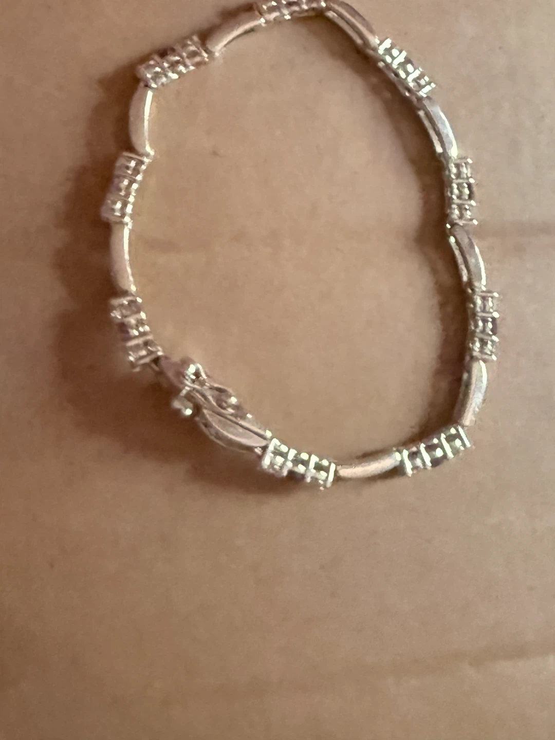 Silver Tone Tennis Bracelet with Clear and Purple Stones