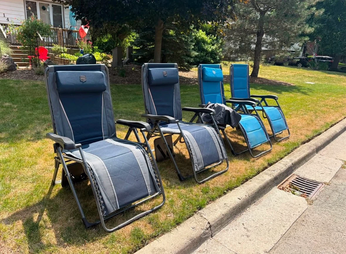 Set of 4 Blue Zero Gravity Chairs - like new