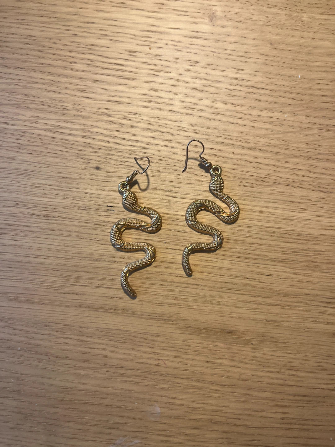 Gold snake earrings