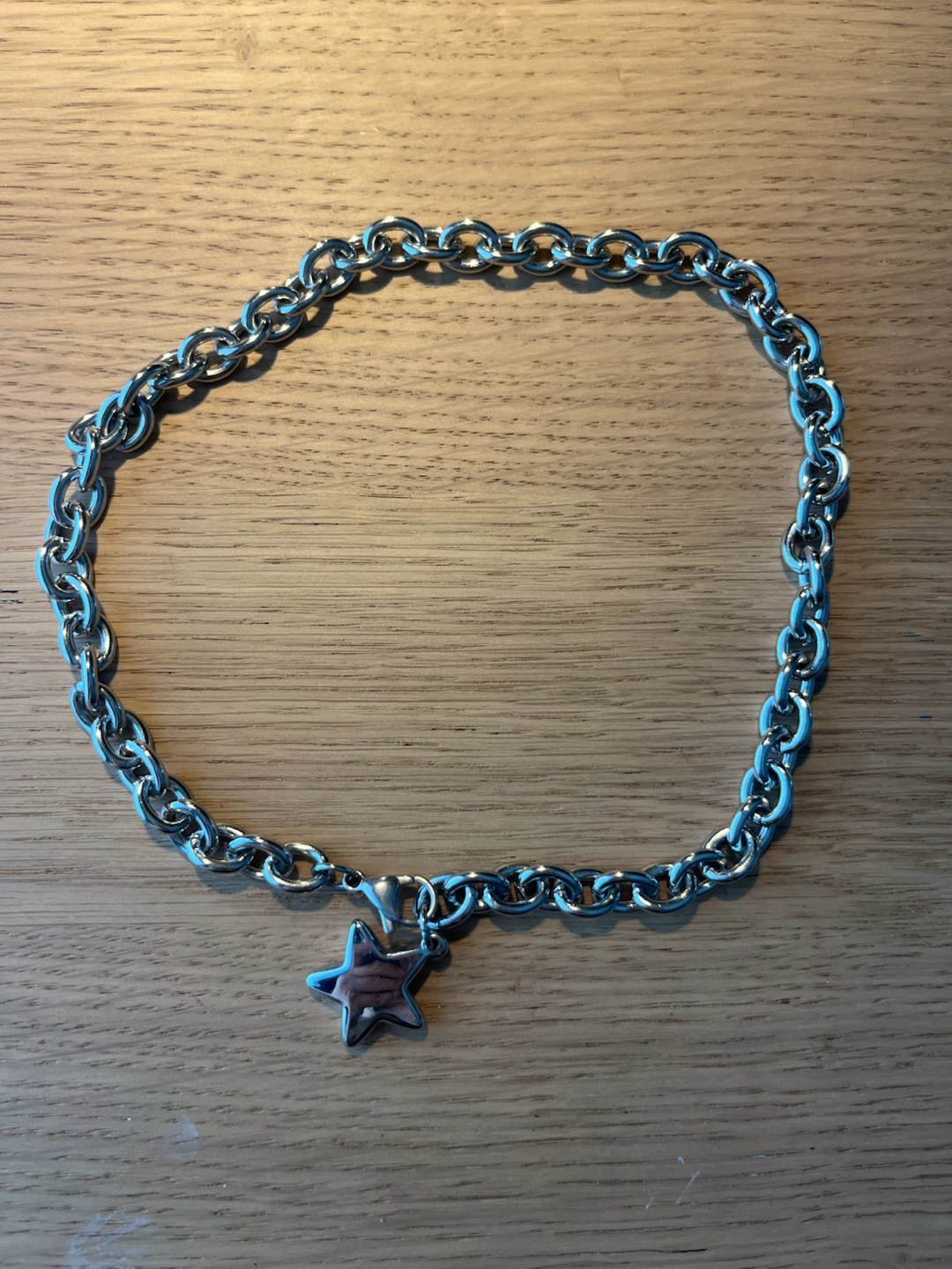 Thick silver chain with star charm