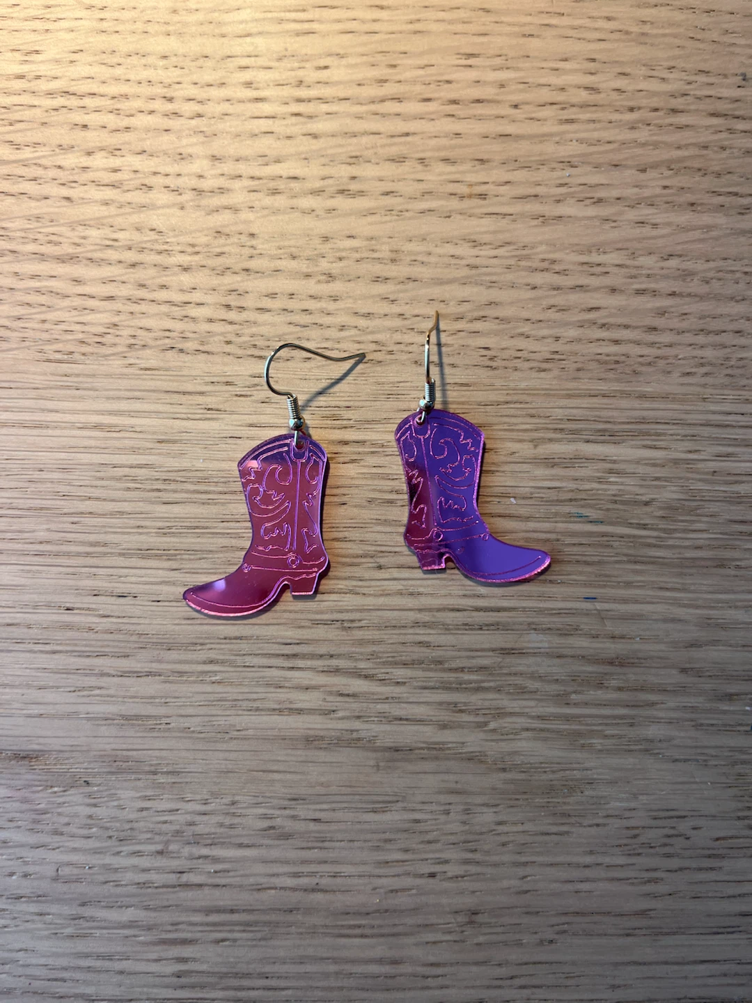 Shiny pink boot earrings