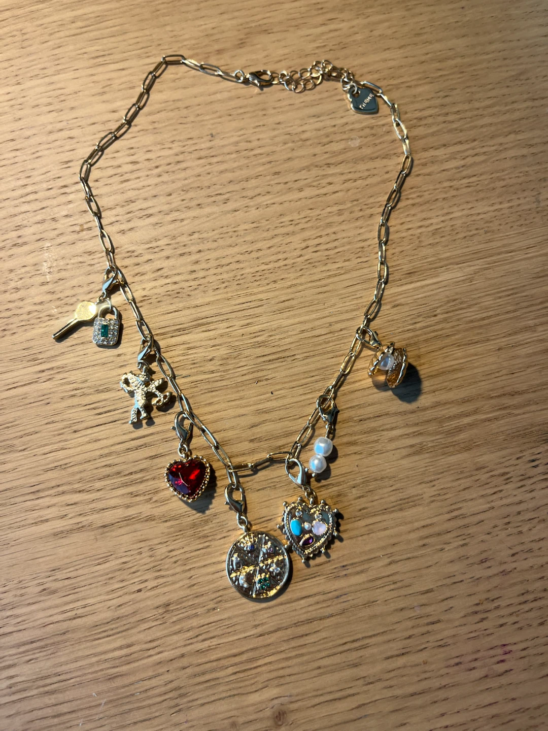 Gold necklace with removable charms