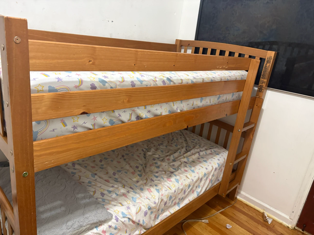 Wooden Bunk Bed with Rainbow Cloud Sheets - photo 2