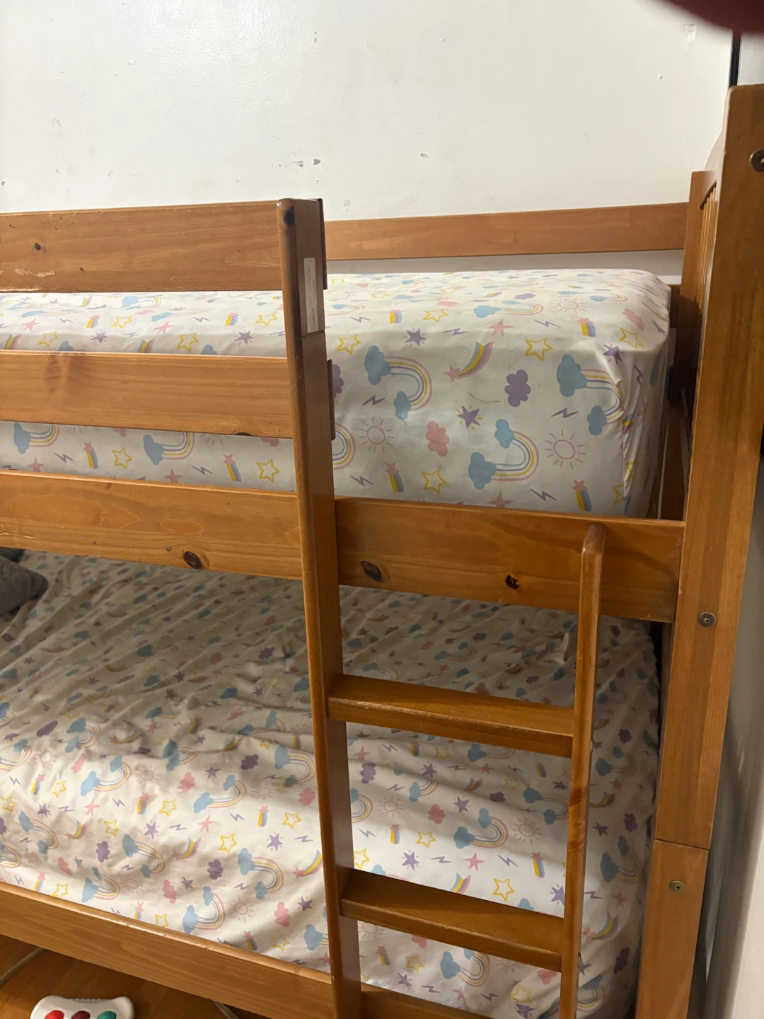 Wooden Bunk Bed with Rainbow Cloud Sheets - photo 3