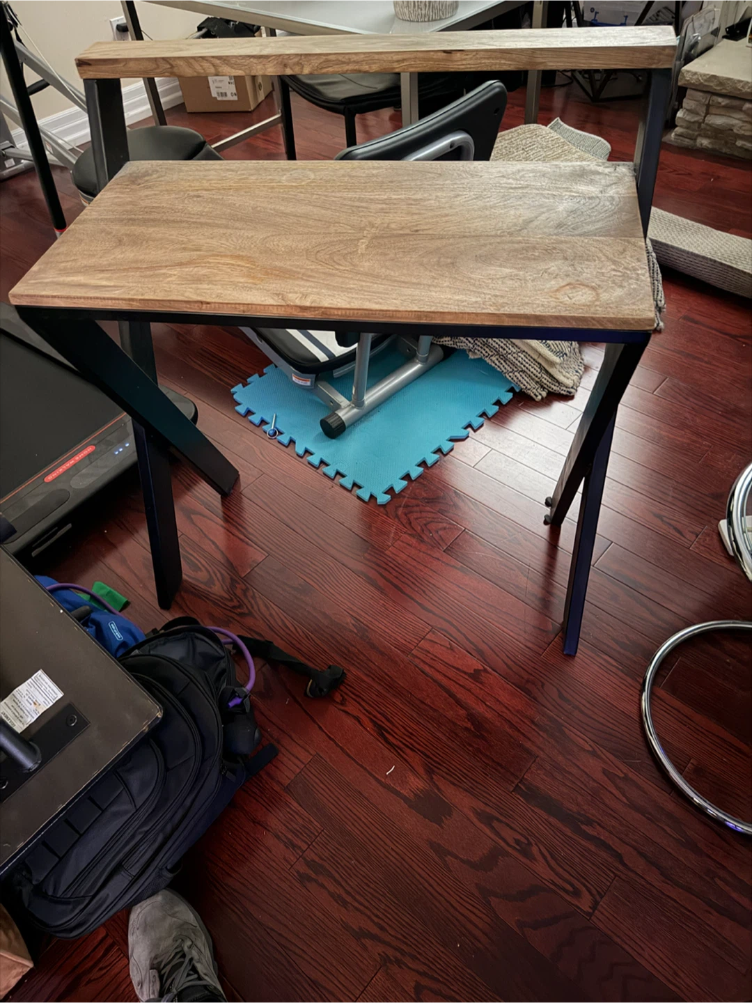 Small wooden table with iron accent