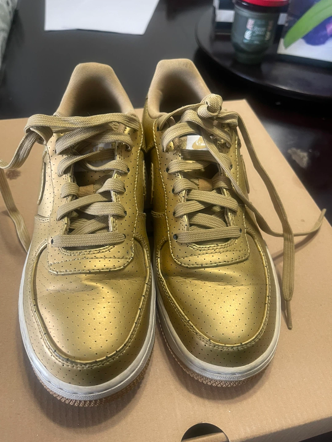 Nike Air Force 1 Gold Sneakers