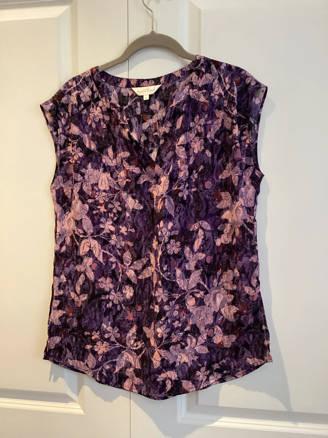 NORTHERN REFLECTIONS TOP