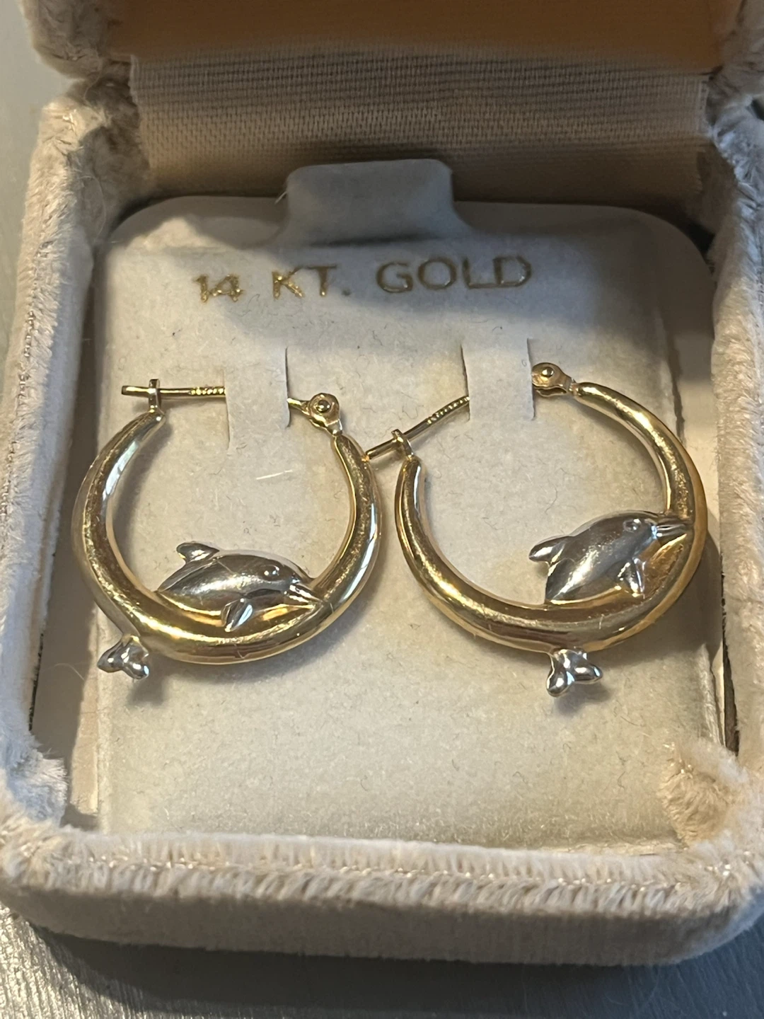 New in box 14 kt gold dolphin earrings