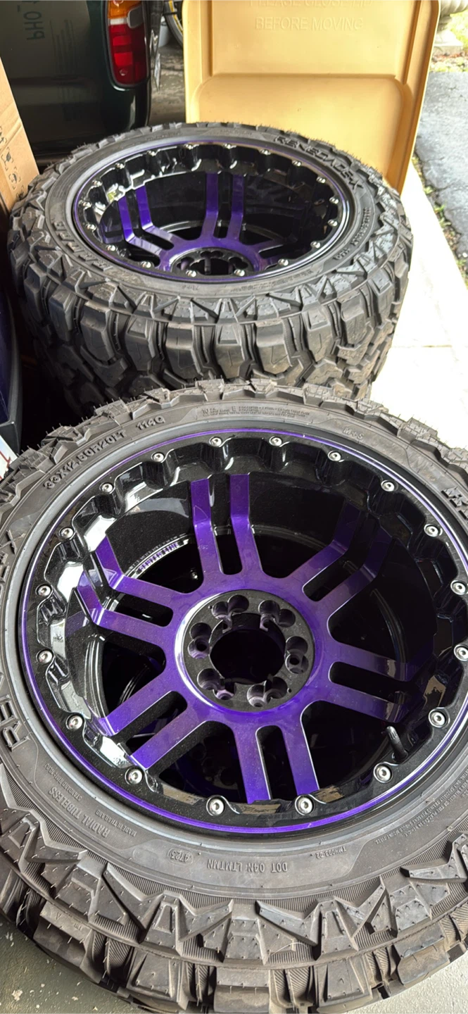 Set of 4 (33x12.50R20LT) Mud Tires with Purple Rims
