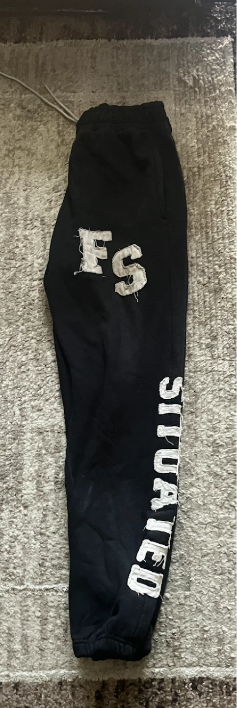 Black Sweatpants with 'FS SITUATED' Graphic