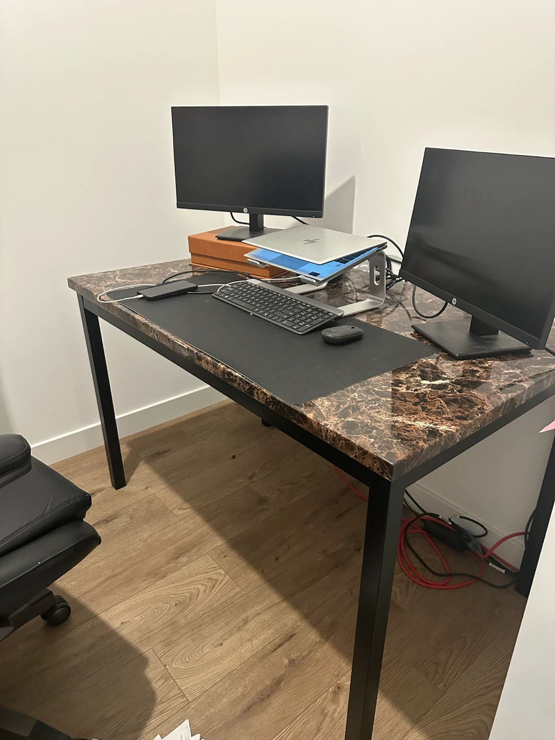 Marble top desk with black metal legs