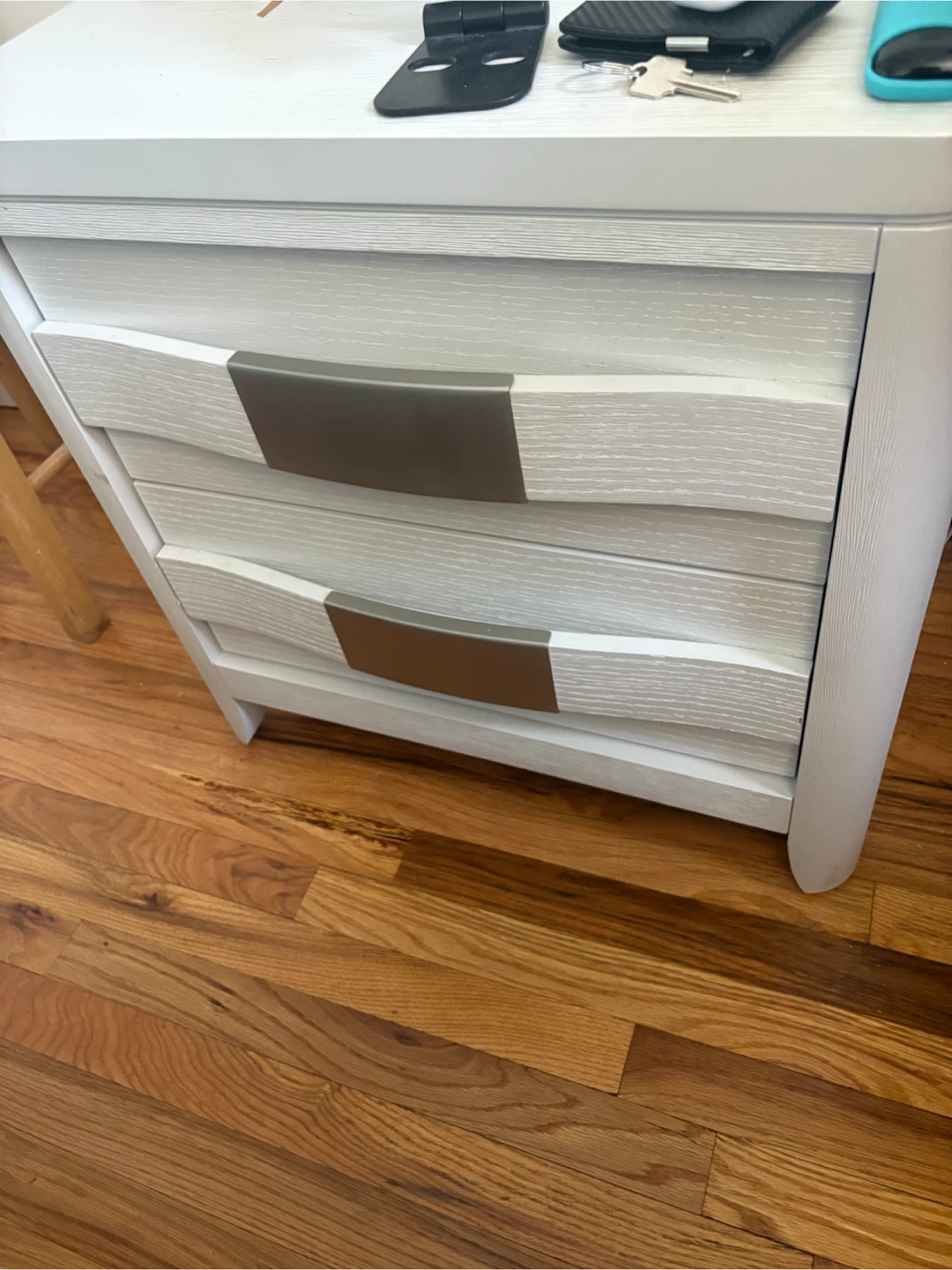 A white wooden nightstand