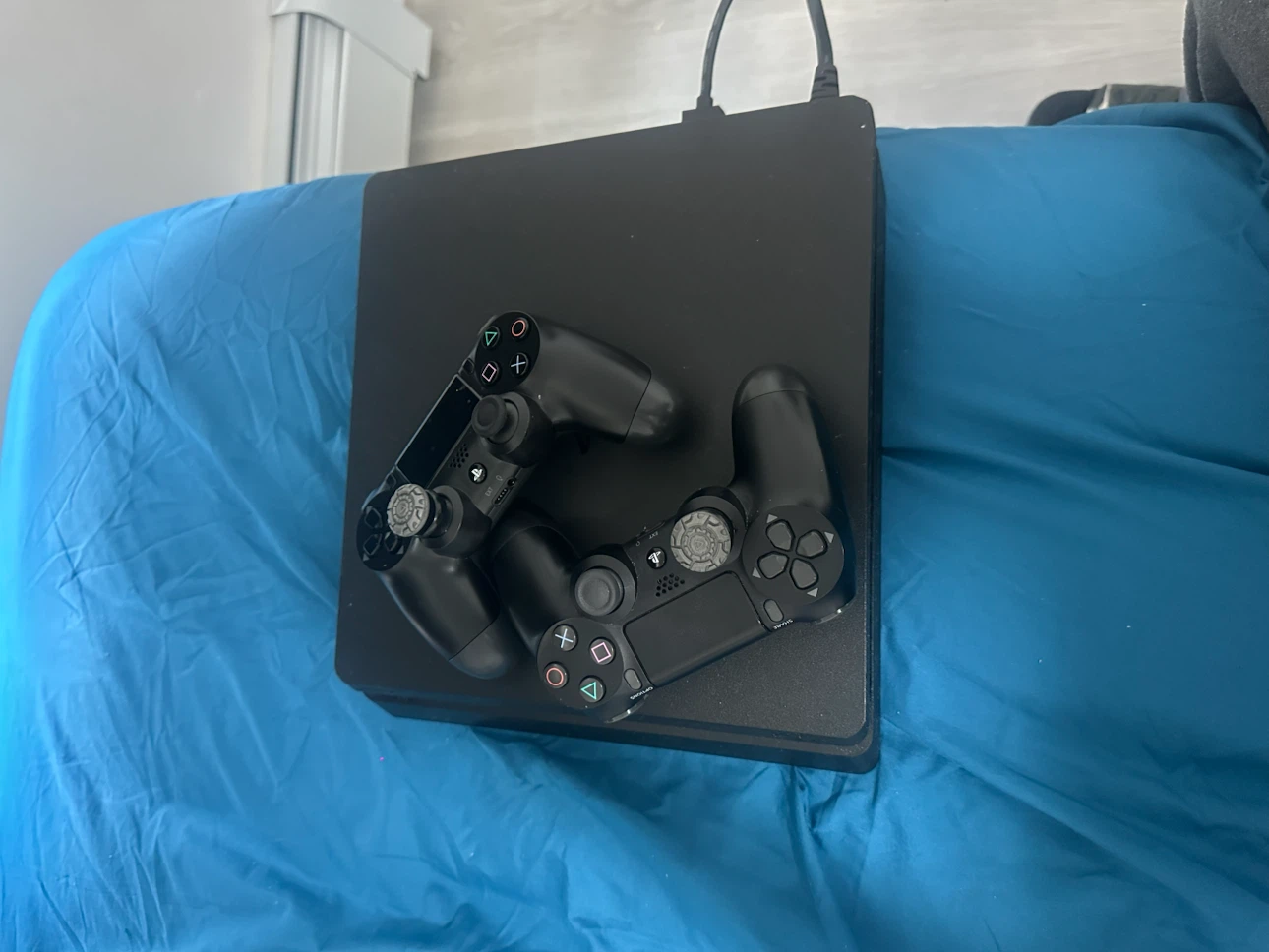 Sony PlayStation 4 Slim Console with 2 Controllers - photo 2