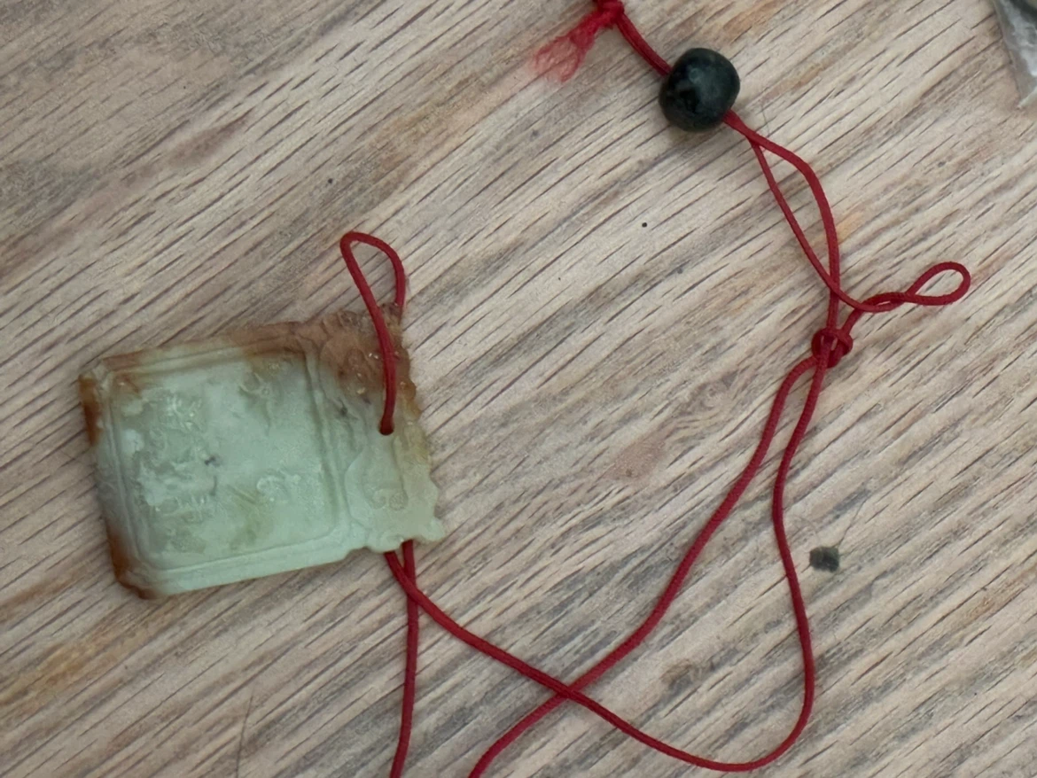 Jade Pendant with Red String