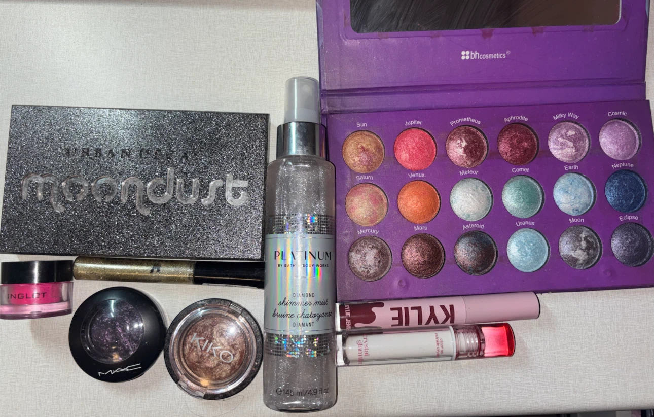 Makeup collection with brushes and a bag
