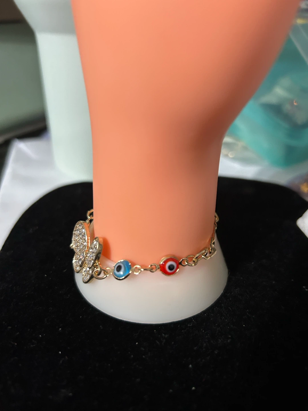 Gold tone butterfly evil eye charm bracelet - photo 3