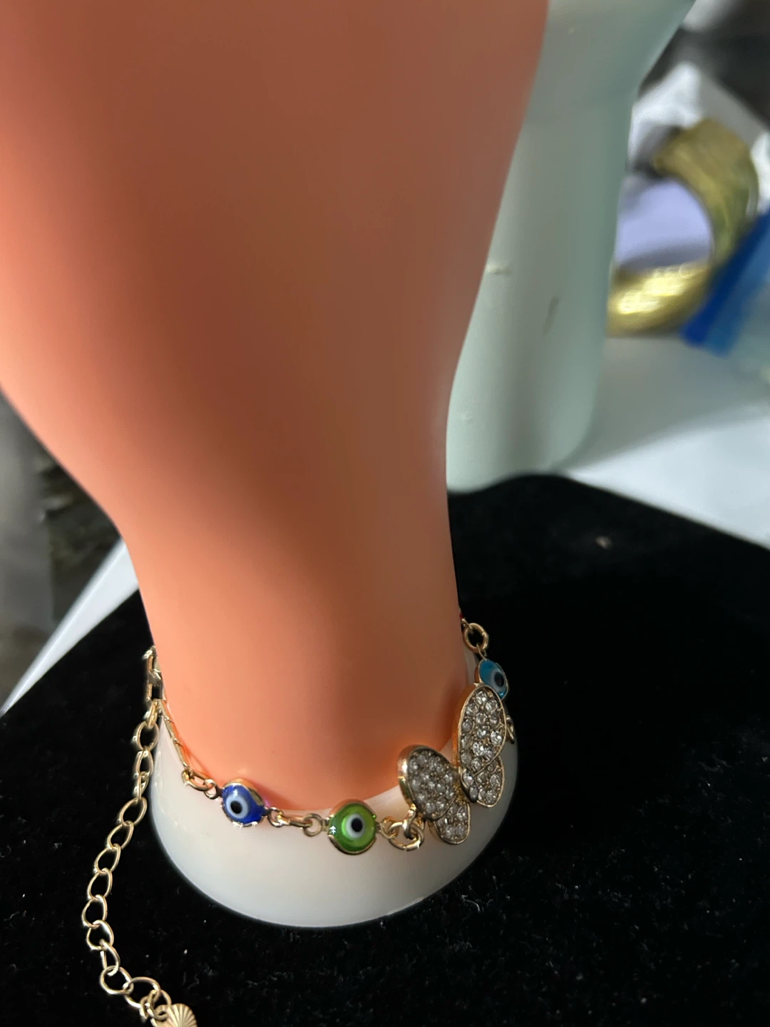 Gold tone butterfly evil eye charm bracelet - photo 4