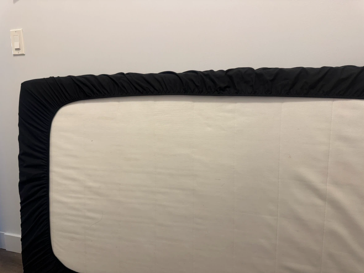 Ikea twin foam mattress and black cover