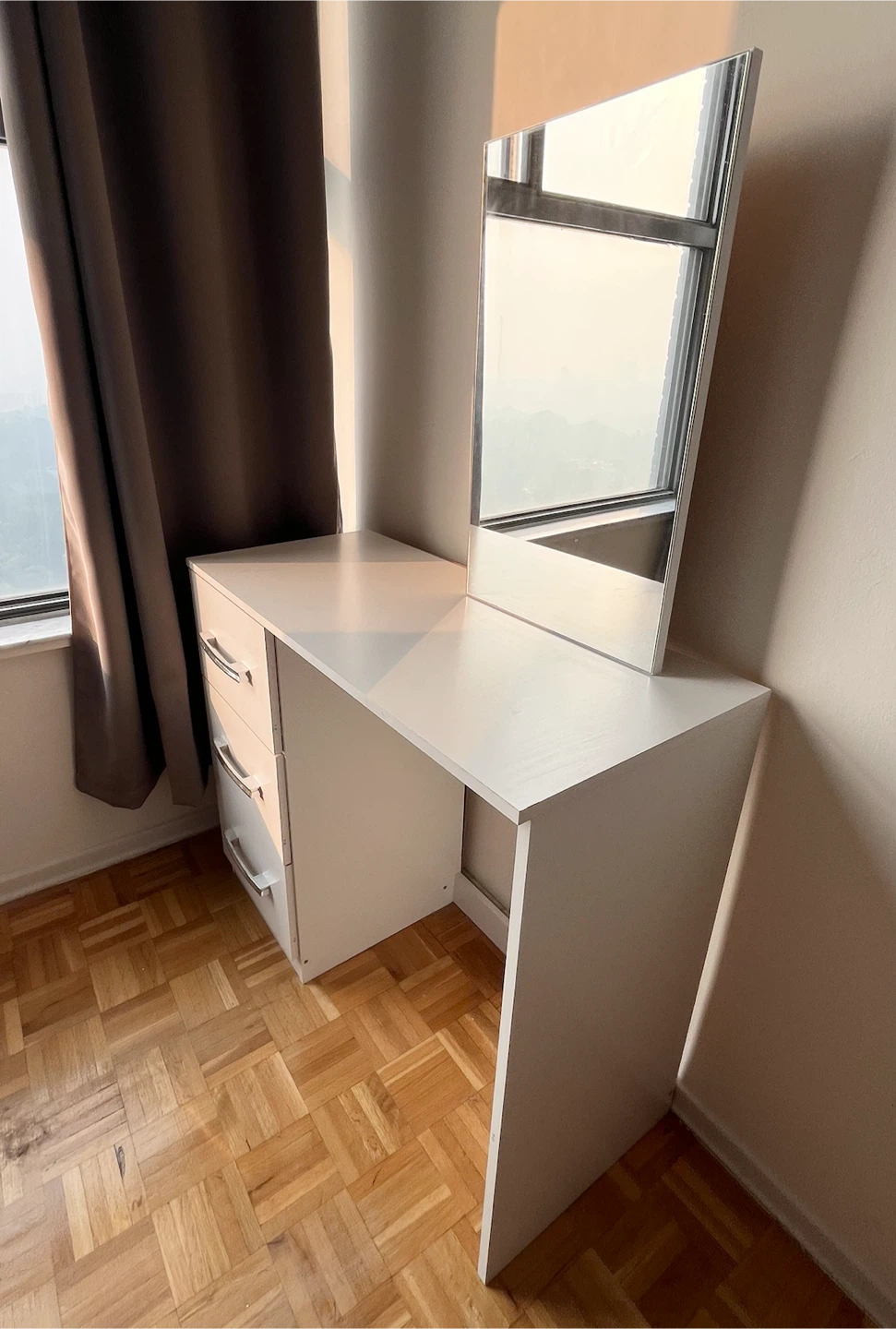 White makeup vanity with mirror