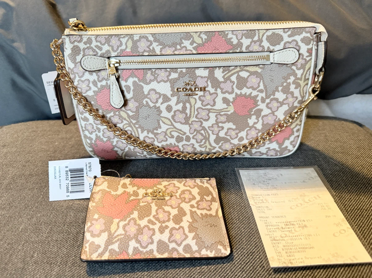 Coach Nolita Wristlet 24  Floral  Coated canvas + card pouch