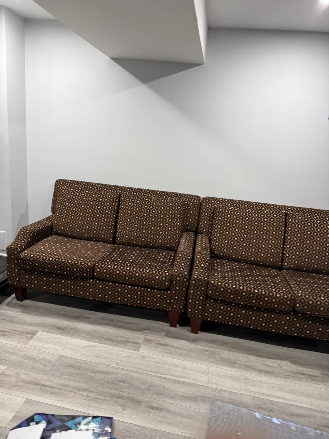 Brown and black sofas