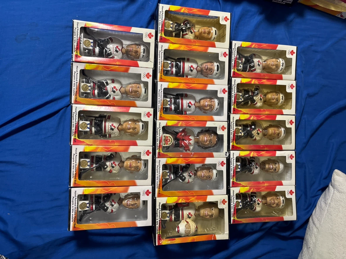 Lot of Hand-Painted Hockey Player Bobbleheads