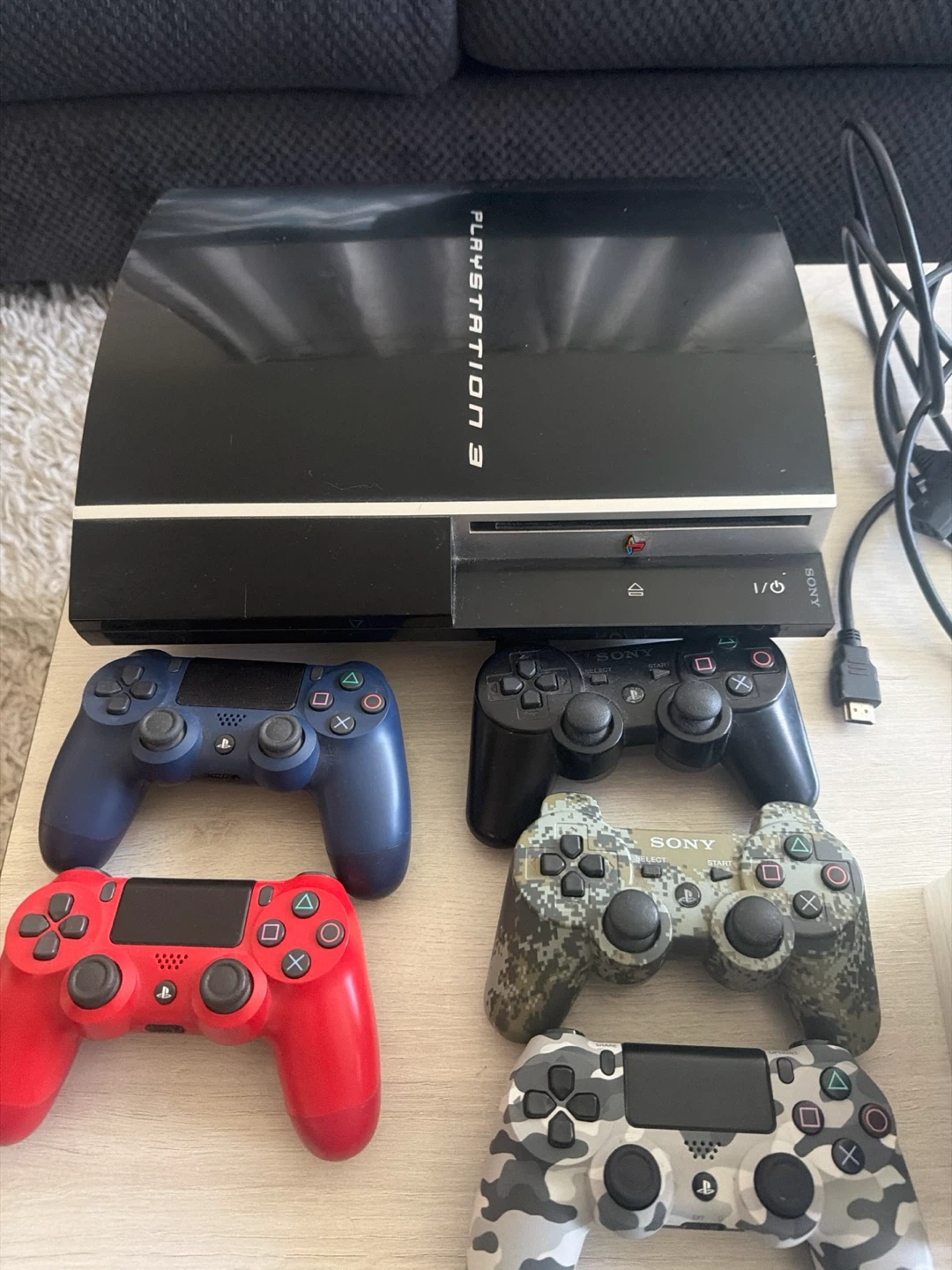 PlayStation 3 Console with 16 Games and 4 Controllers