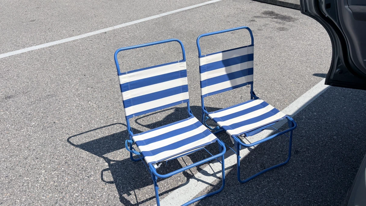 Pair of Blue and White Striped Folding Beach Chairs