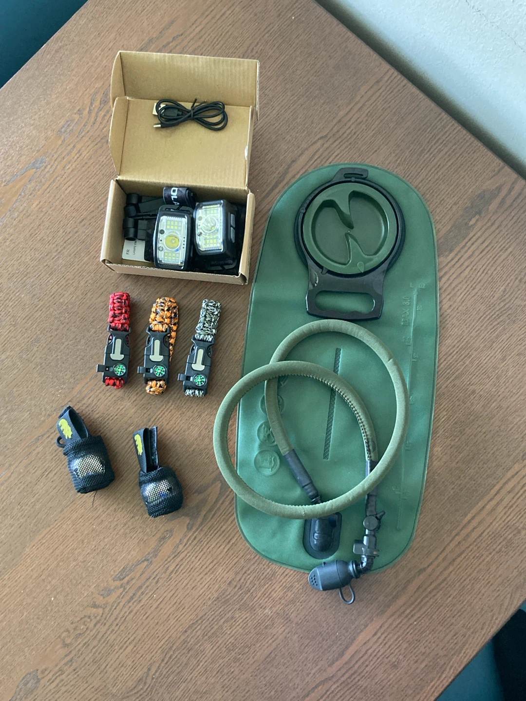 Outdoor Bracelets, Rechargeable Headlamps and a Bladder