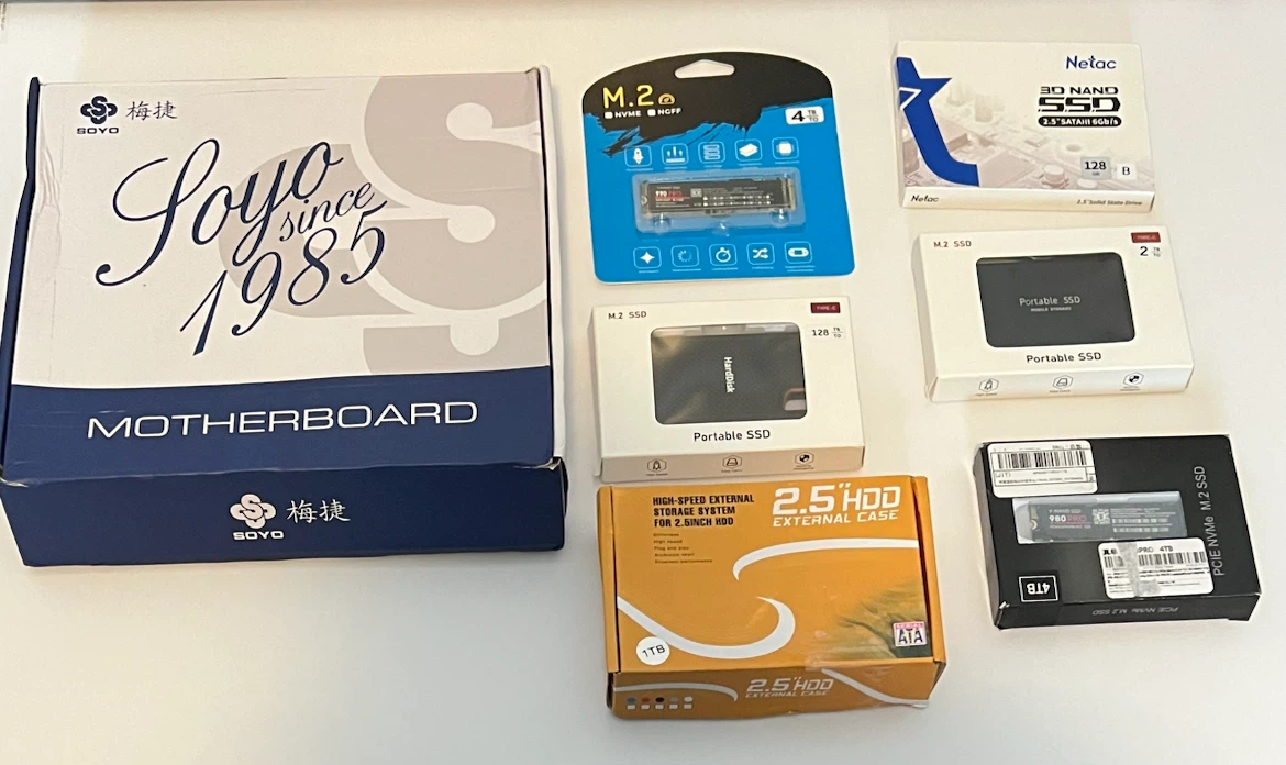 Assorted Portable SSDs, NVMe SSD, and External HDD Enclosure