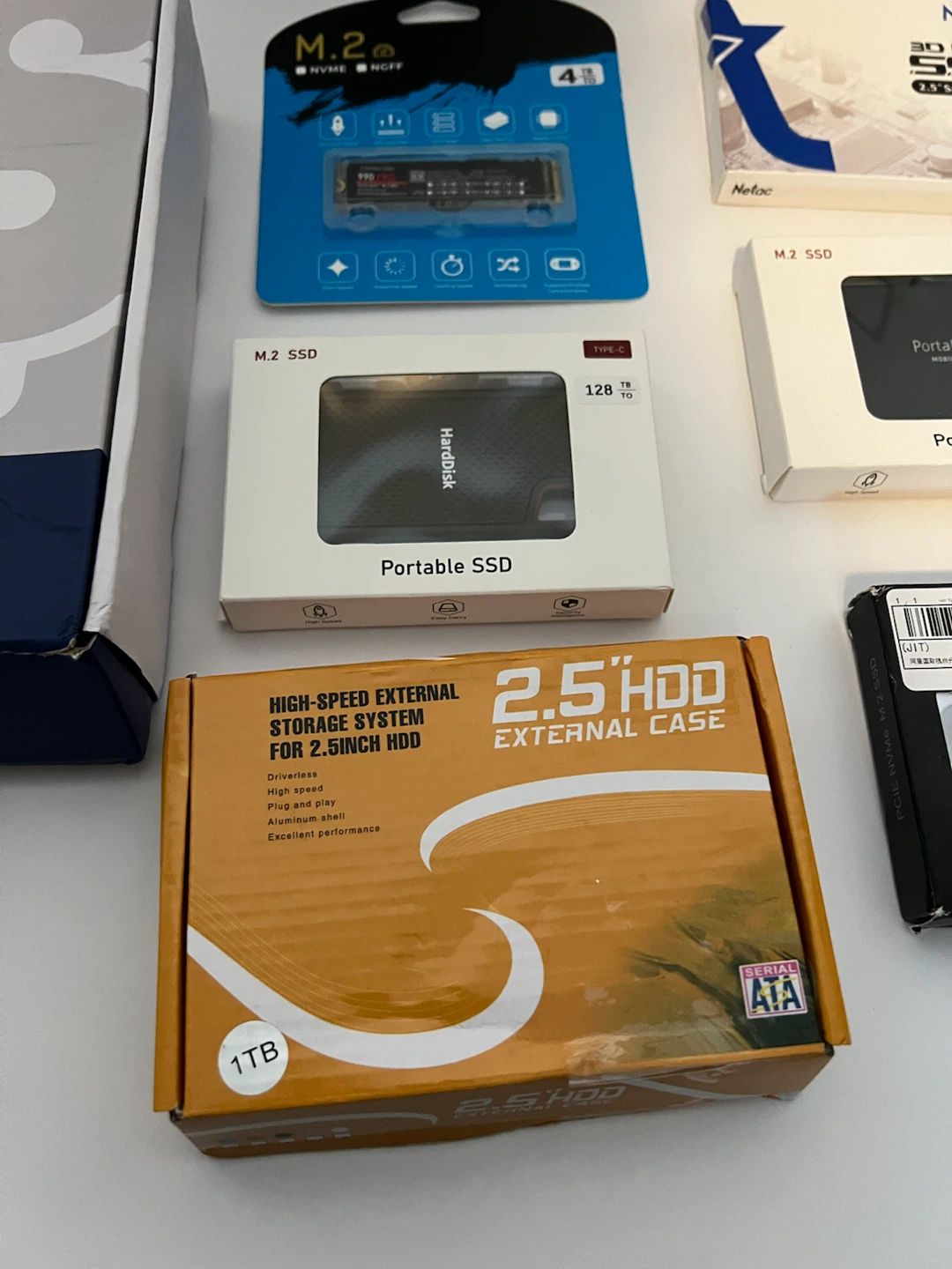 Assorted Portable SSDs, NVMe SSD, and External HDD Enclosure - photo 5