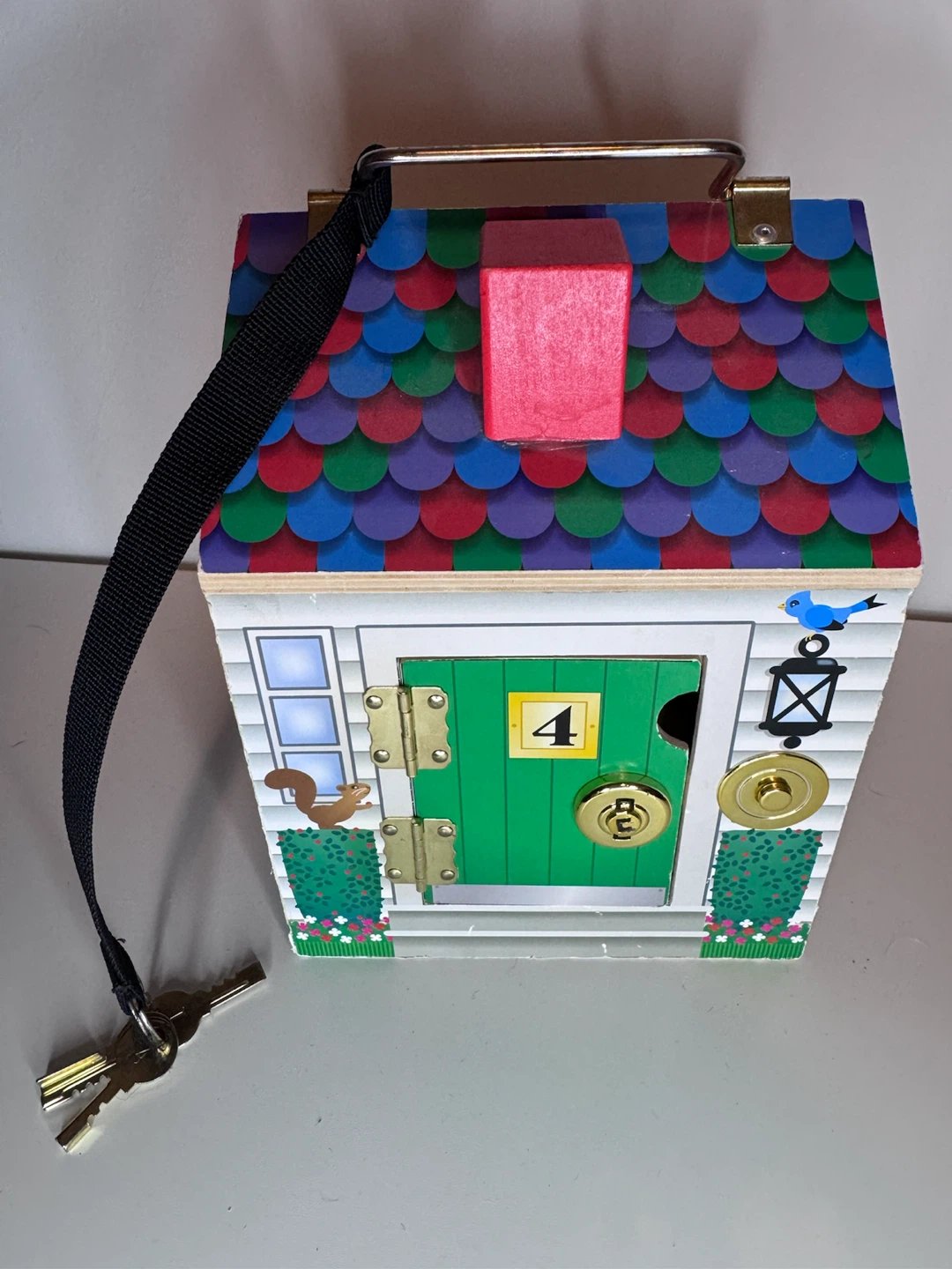 Melissa & Doug Wooden Activity House, includes new batteries