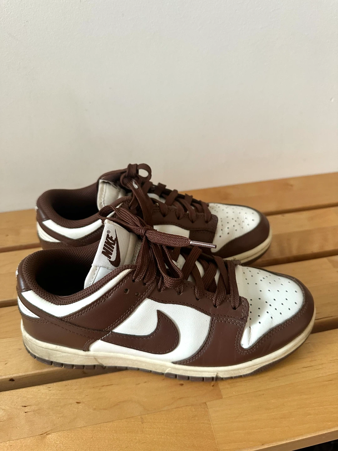 brown and white nike low dunks