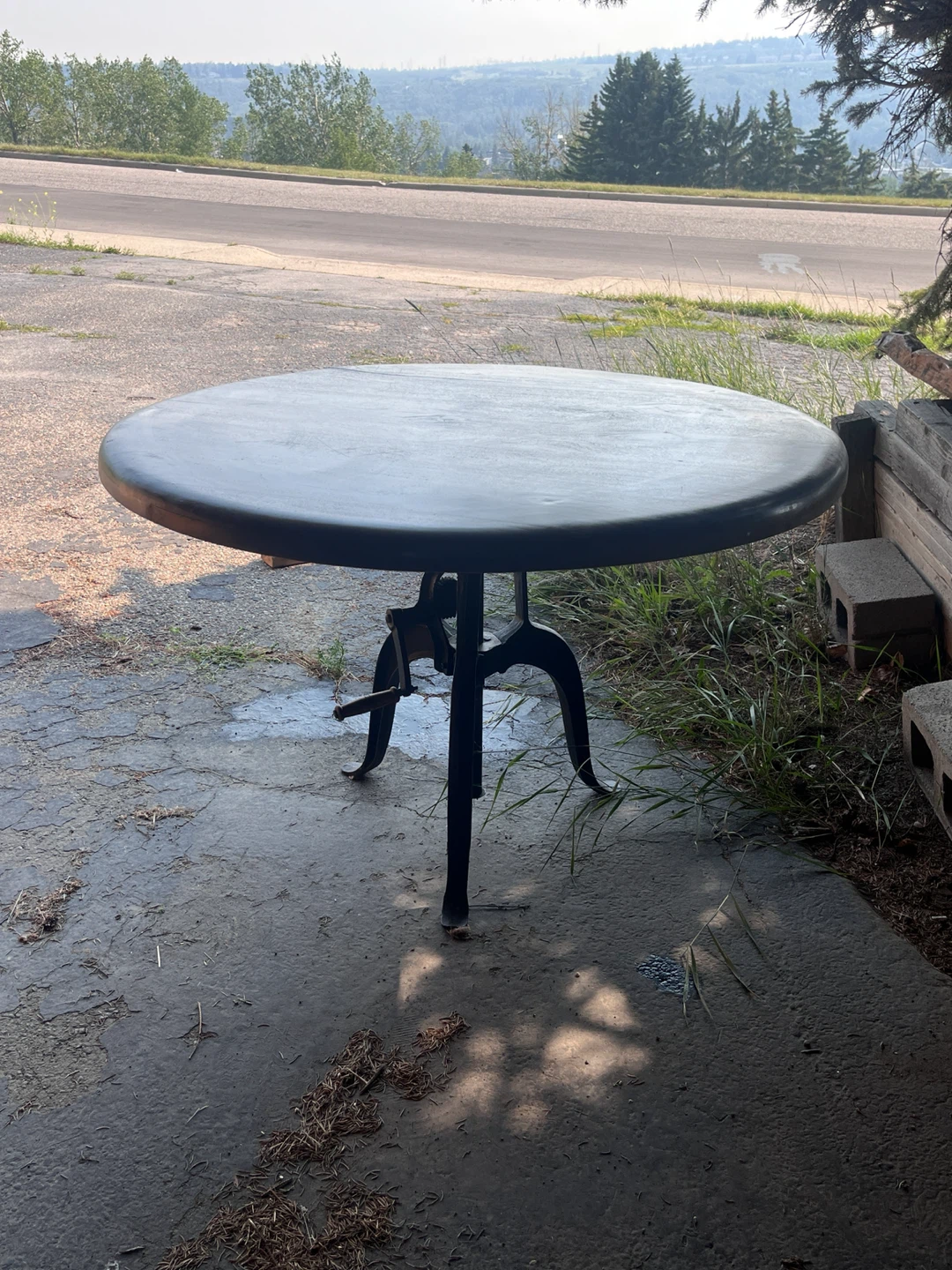 Four Hands Round Wood Table with Adjustable Cast Iron Base