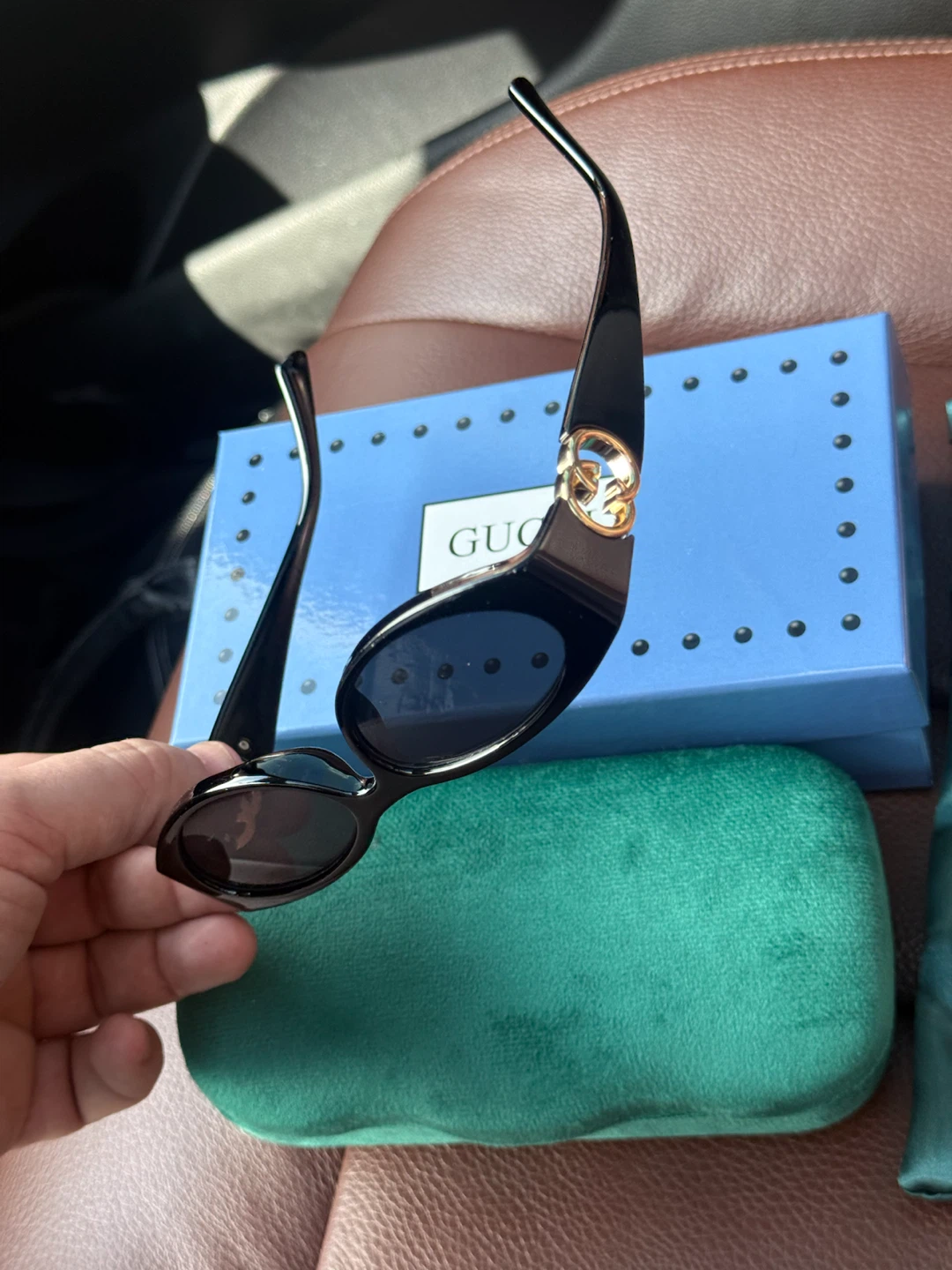 Gucci Black Oval Sunglasses