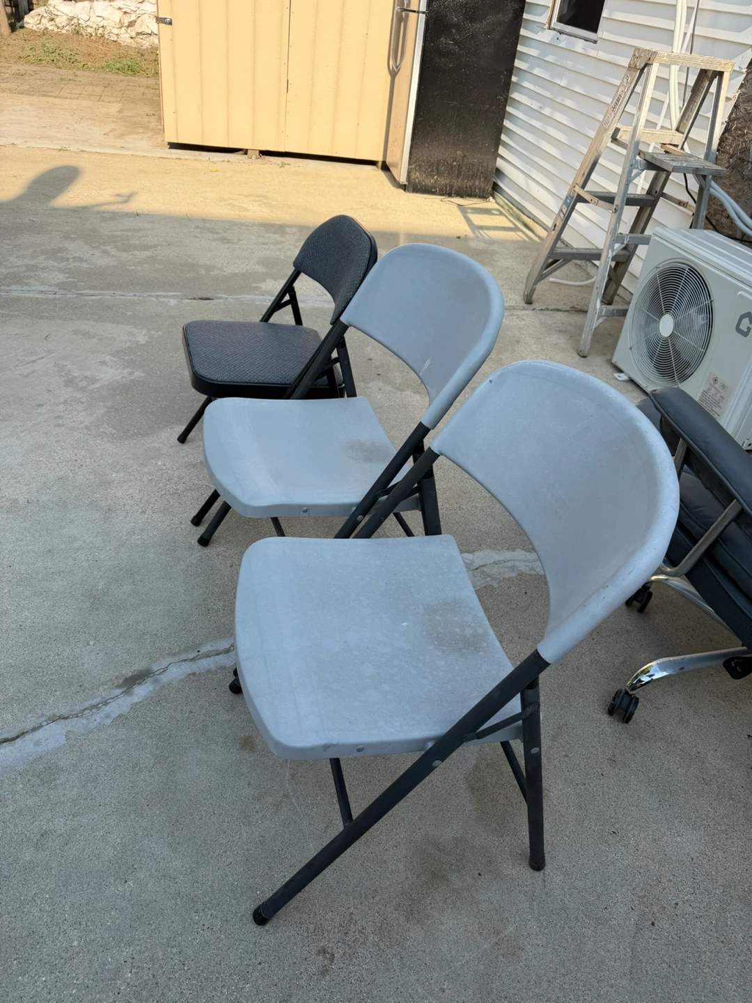 Cosco Folding Chairs (Set of 2) and 1 black chair