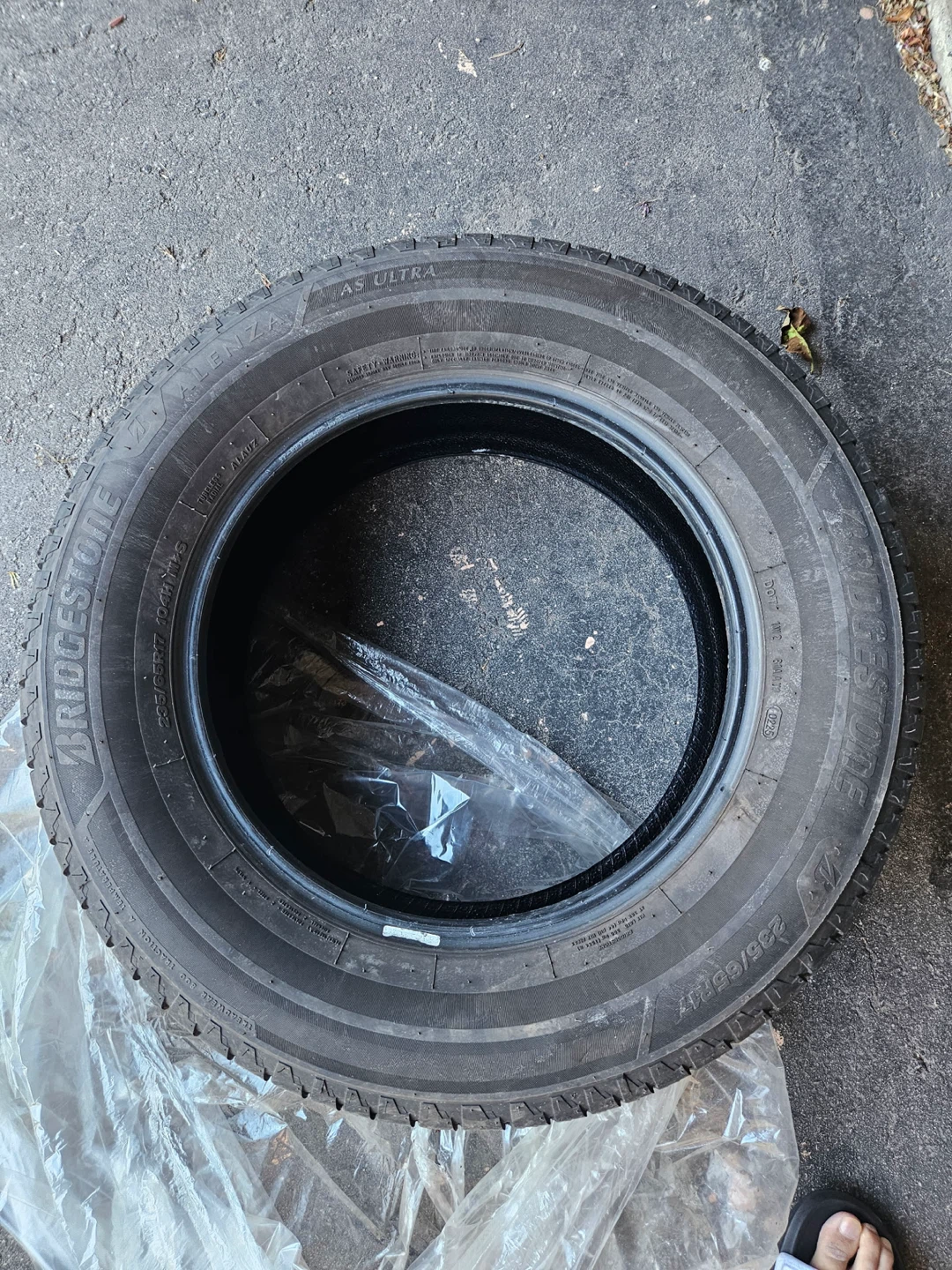 Pair of like New Bridgestone All-Weather Tires-235/65R17
