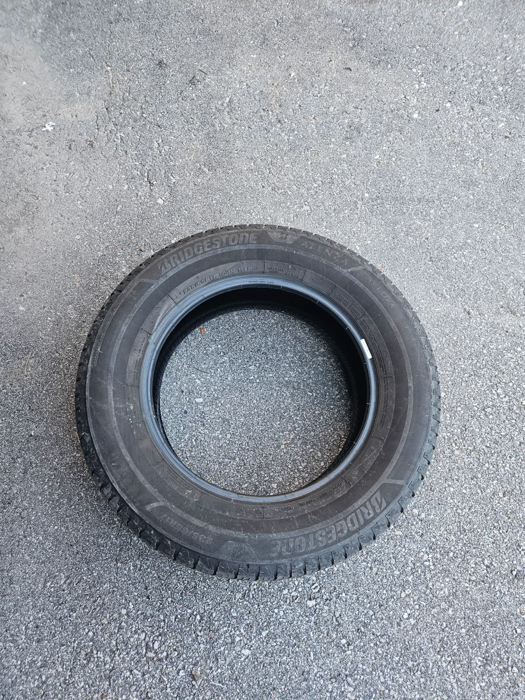 Pair of like New Bridgestone All-Weather Tires-235/65R17 - photo 3